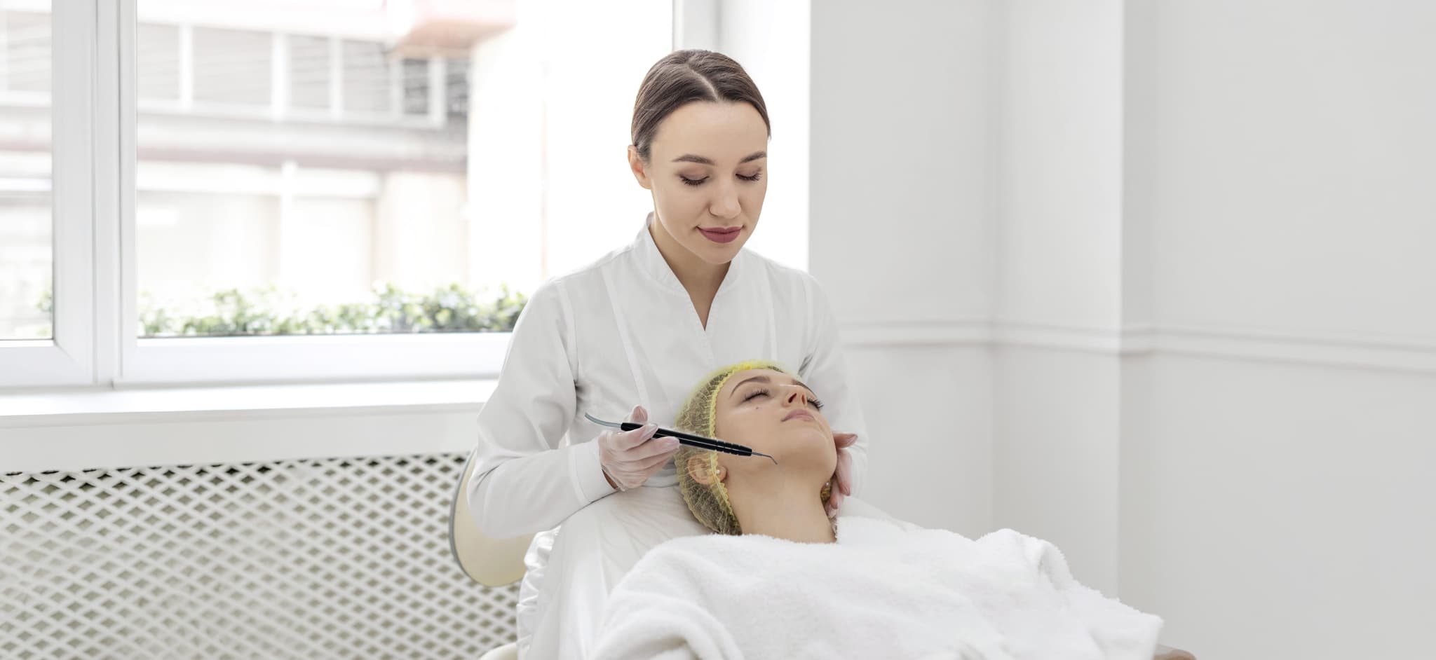 Clinician performing a SuperFrecator skin treatment